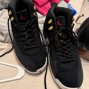 Jordan Black and Gold Sneakers